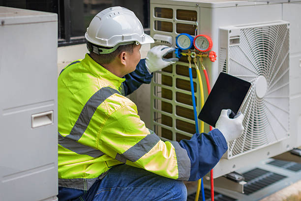 Professional Ac Installation technician working in Mead, WA